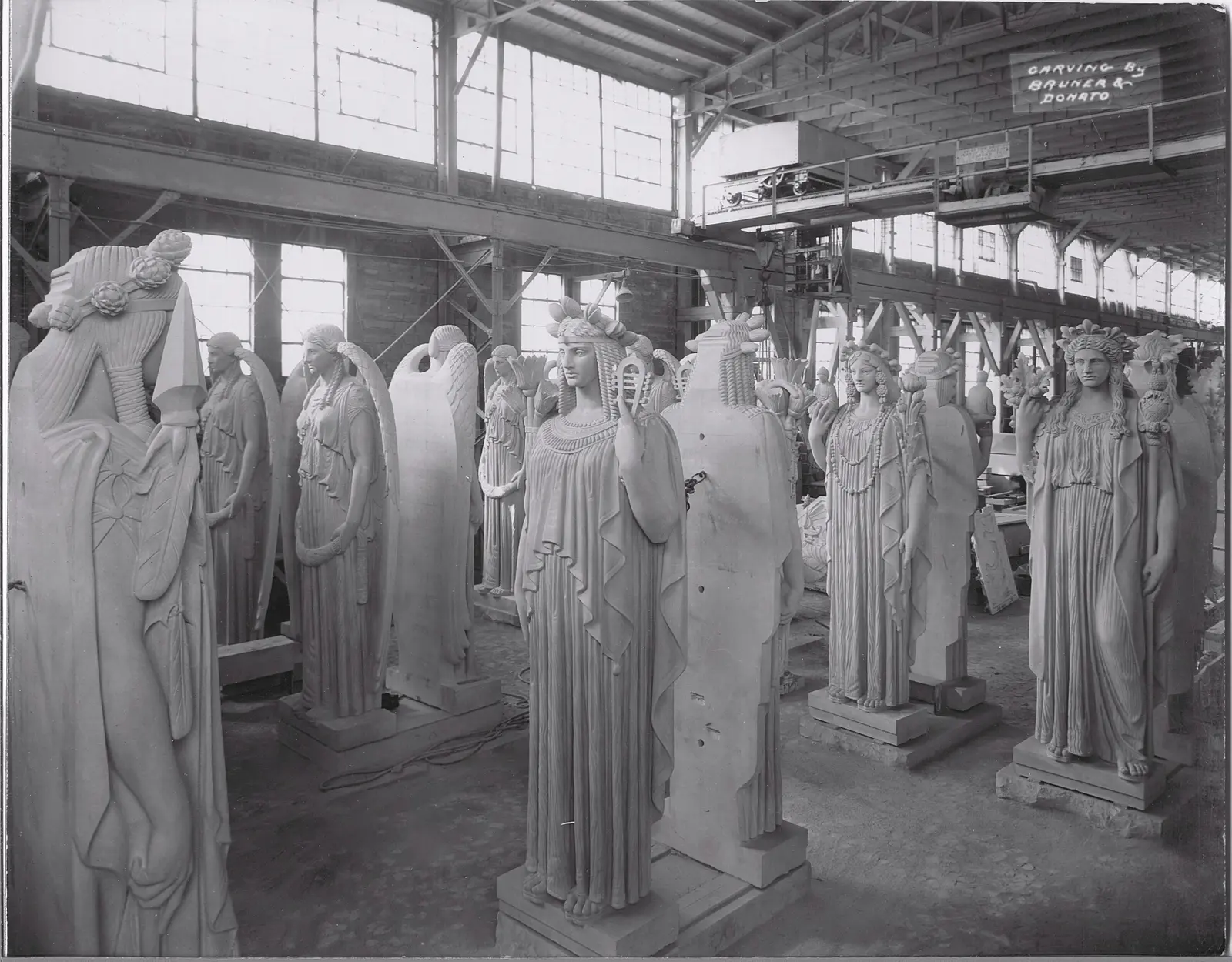 Stone figures photographed on the Bruner and Donato shop floor